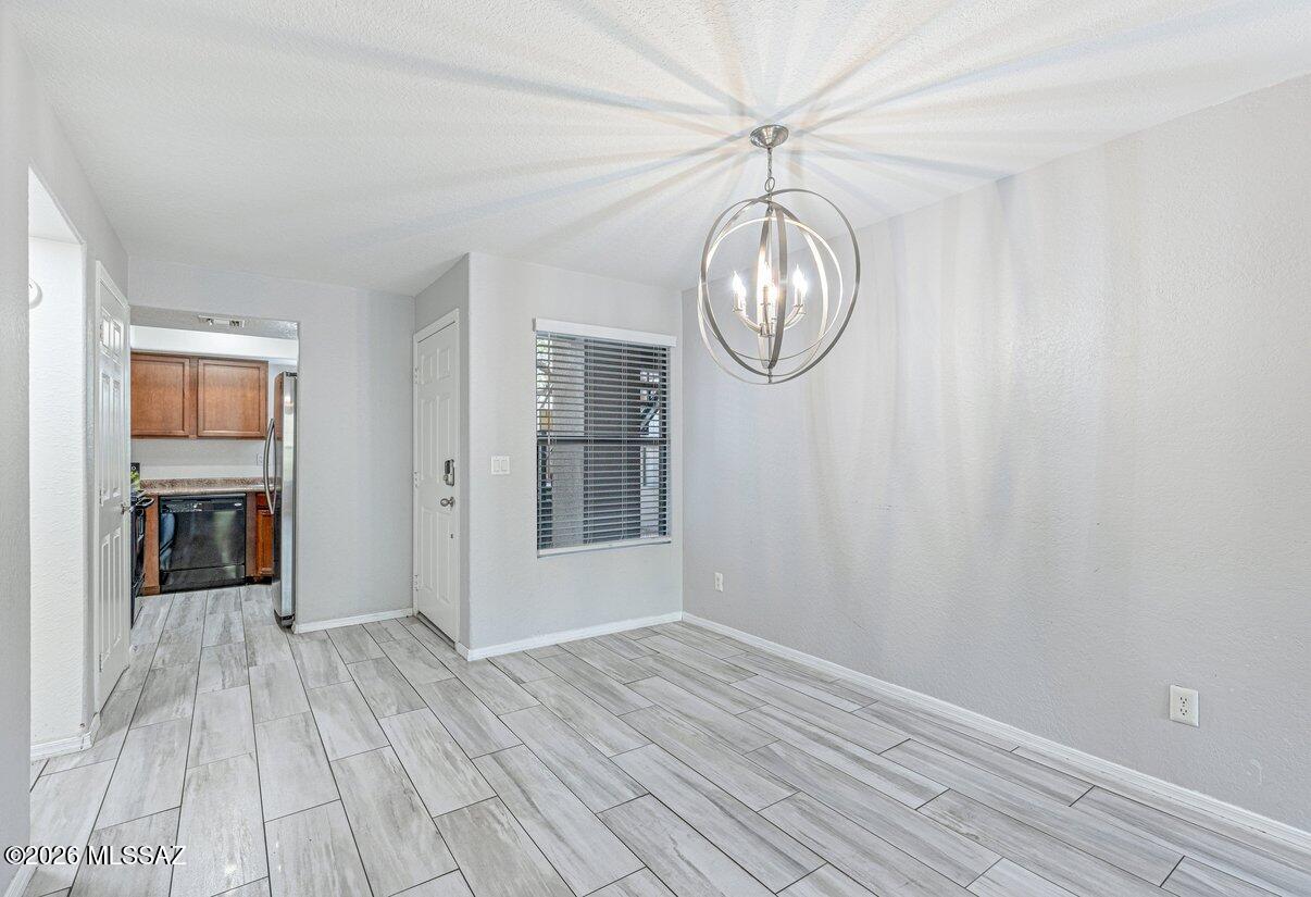 5800 North Kolb Road, Unit 1104 Tucson, AZ 85750 - Photo 5 of 29 Dining area, kitchen and entry