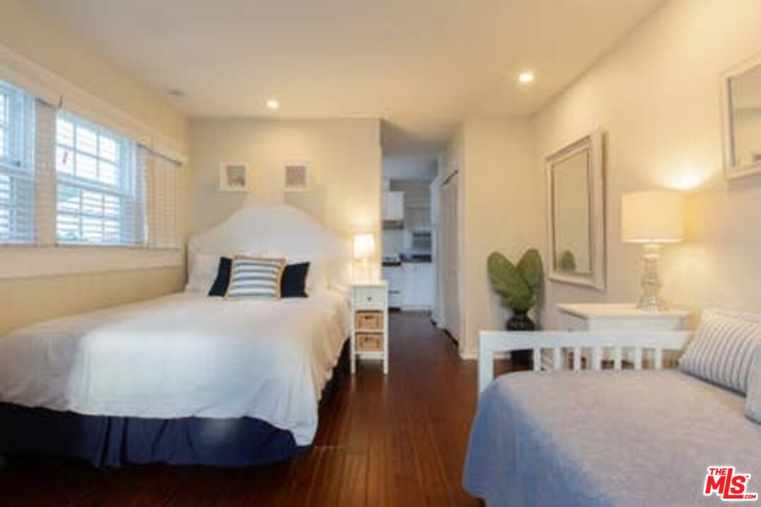 2318 Strongs Drive Venice, CA 90291 - Photo 12 of 19 a bedroom with a bed and wooden floor