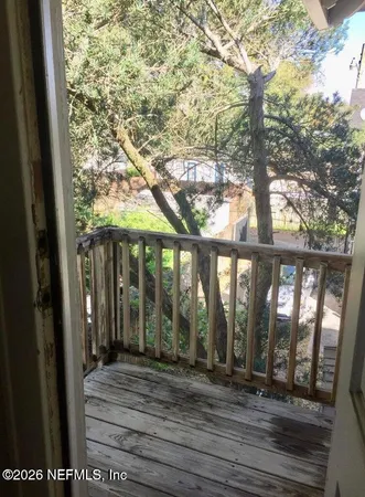 a view of empty room with windows