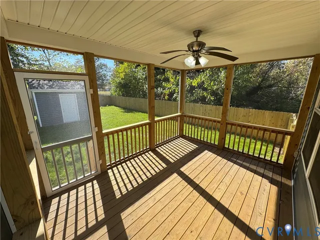 a bathroom with a shower and a sink