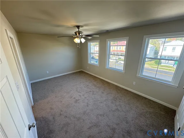 a bathroom with a sink toilet vanity and tub