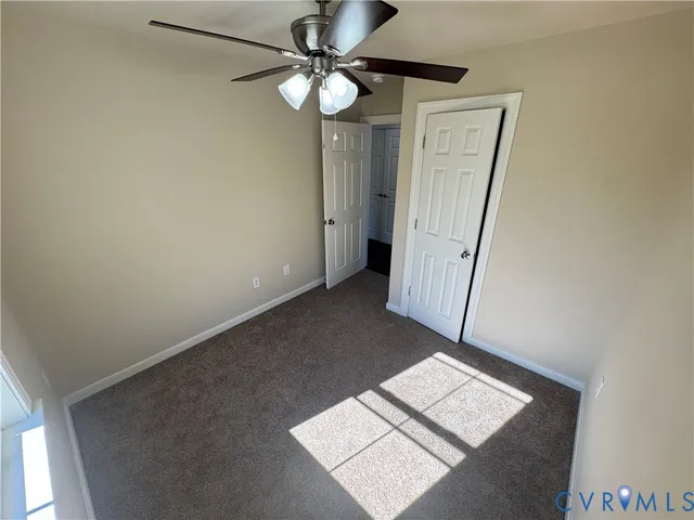 a view of a backyard of the house