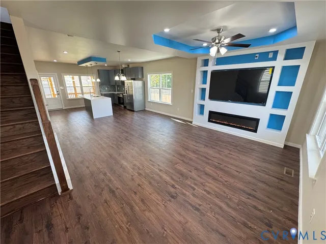 a bathroom with a sink toilet and window