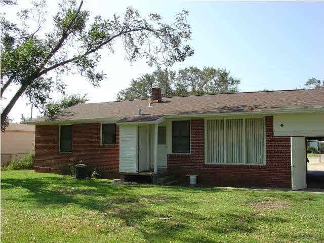 122 Rue Max Street Pensacola, FL 32507 - Photo 3 of 9 Rear view of home.