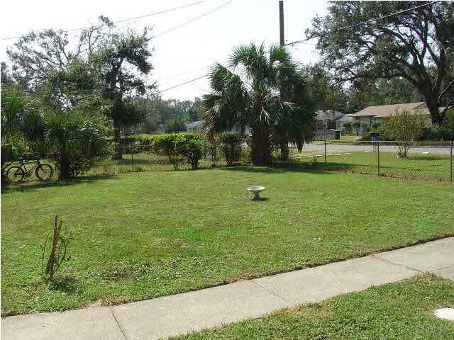 122 Rue Max Street Pensacola, FL 32507 - Photo 8 of 9 Front yard.