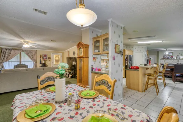 a living room with furniture and a table