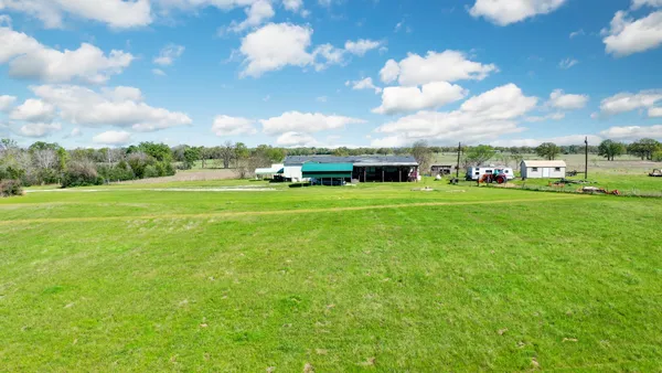 a view of a garden with houses