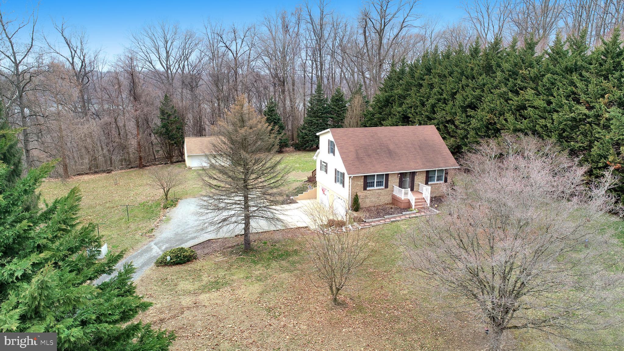 Perfectly Situated on 5.5 Acre Lot