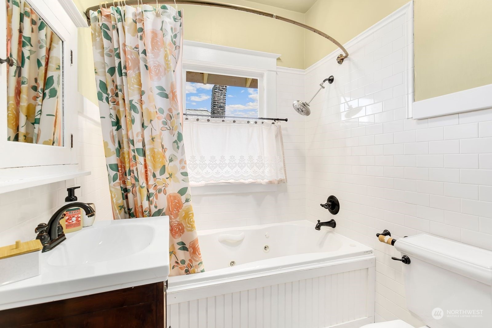 3102 8th Street Everett, WA 98201 - Photo 12 of 22 a bathroom with a sink and a bathtub