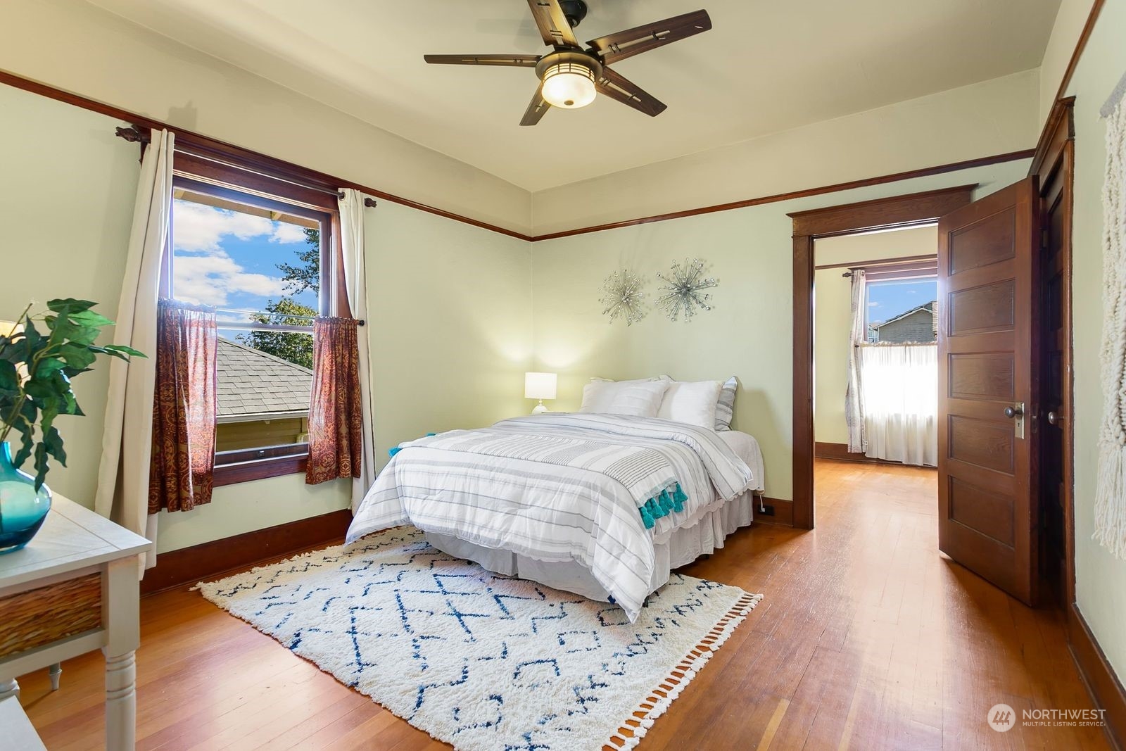 3102 8th Street Everett, WA 98201 - Photo 10 of 22 a bedroom with a large bed and a window