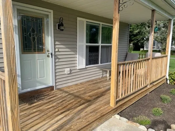 a view of a door and a window
