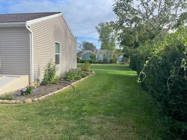 a view of a backyard with a garden