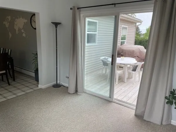 a view of gallery with wooden floor
