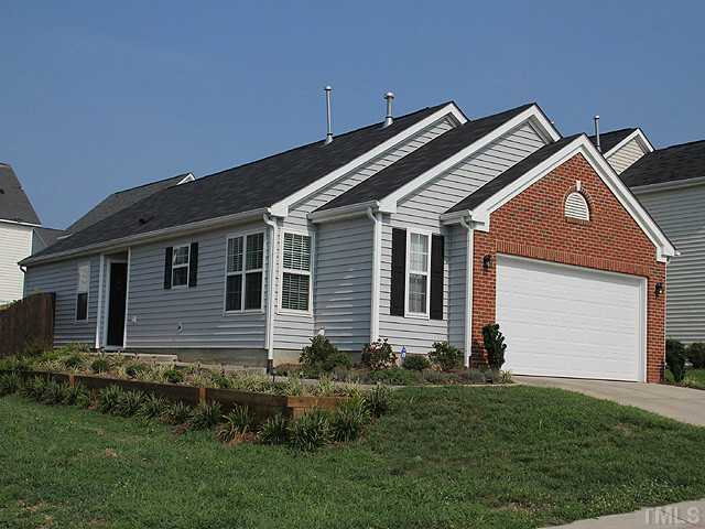 4817 Mocha Lane Raleigh, NC 27616 - Photo 1 of 12 a front view of a house with a yard