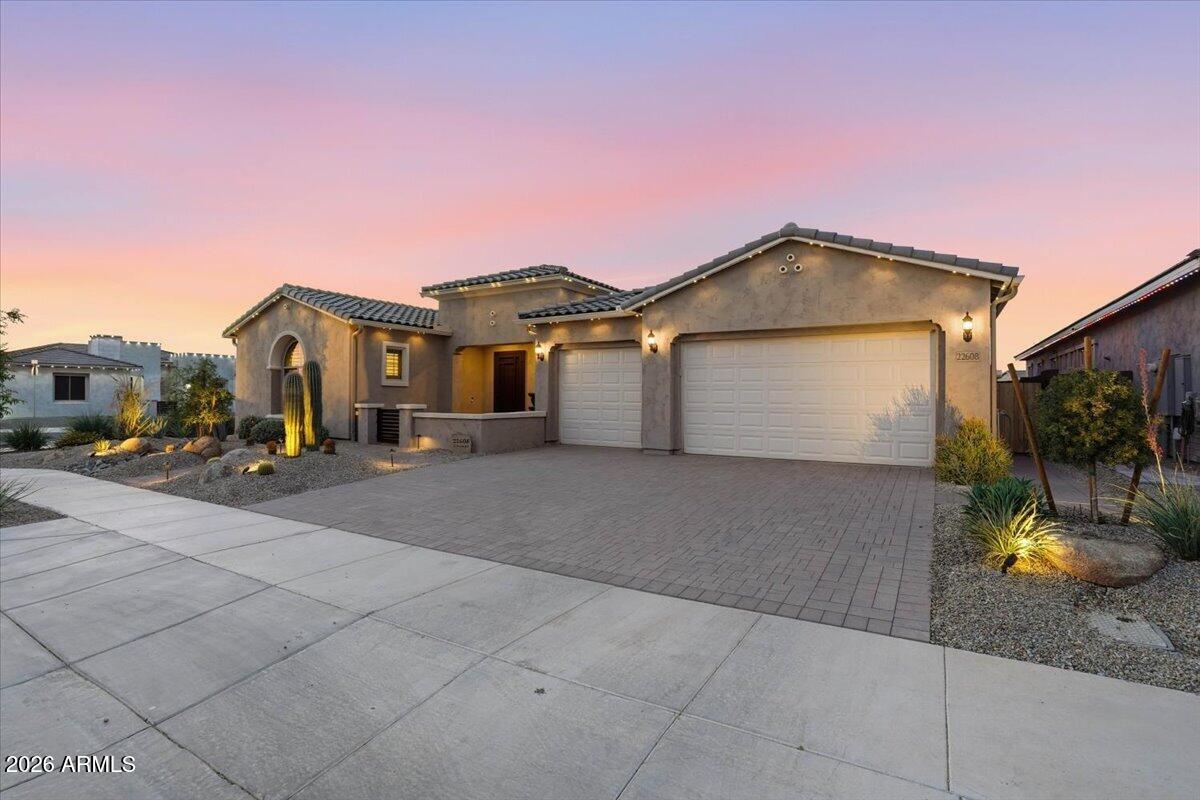 22608 East Stacey Road Queen Creek, AZ 85142 - Photo 43 of 83 a front view of a house with a yard and garage