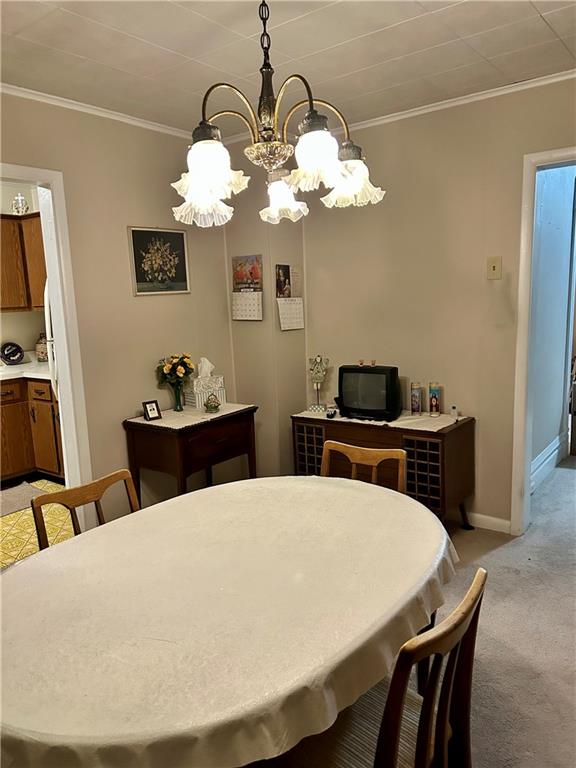 514 South Washington Street Butler, PA 16001 - Photo 11 of 27 a view of a dining room with furniture and wooden floor