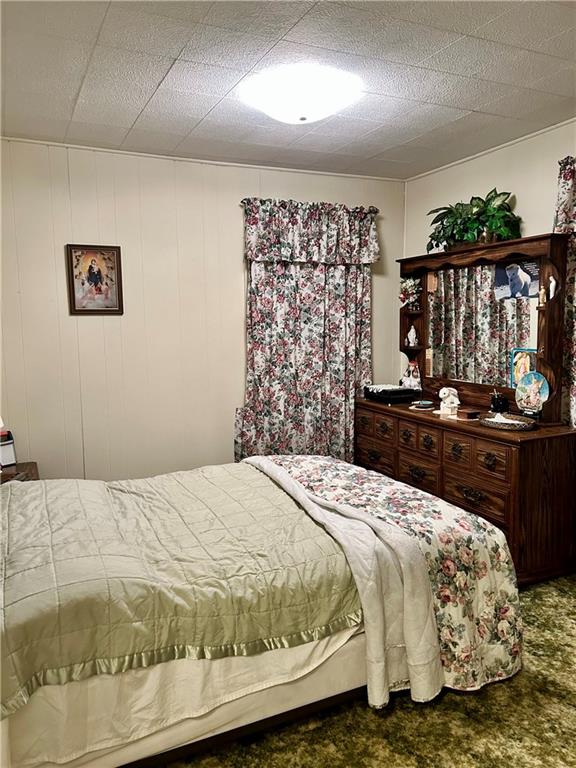 514 South Washington Street Butler, PA 16001 - Photo 14 of 27 a bedroom with a bed and dresser