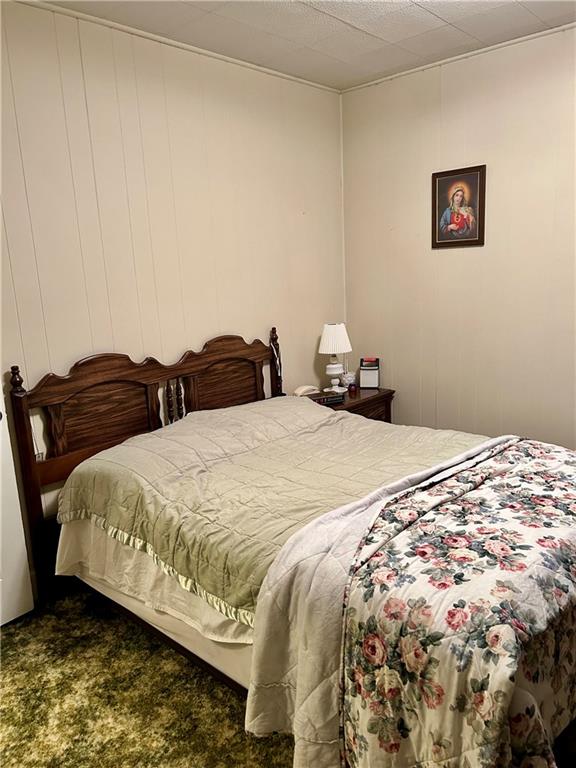 514 South Washington Street Butler, PA 16001 - Photo 15 of 27 a bedroom with bed and cupboard