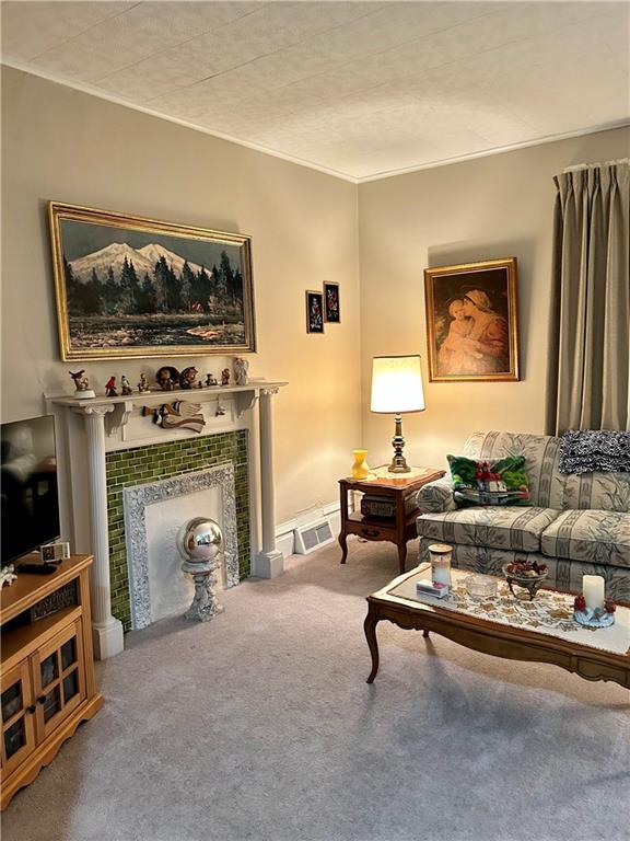 514 South Washington Street Butler, PA 16001 - Photo 8 of 27 a living room with furniture and a flat screen tv