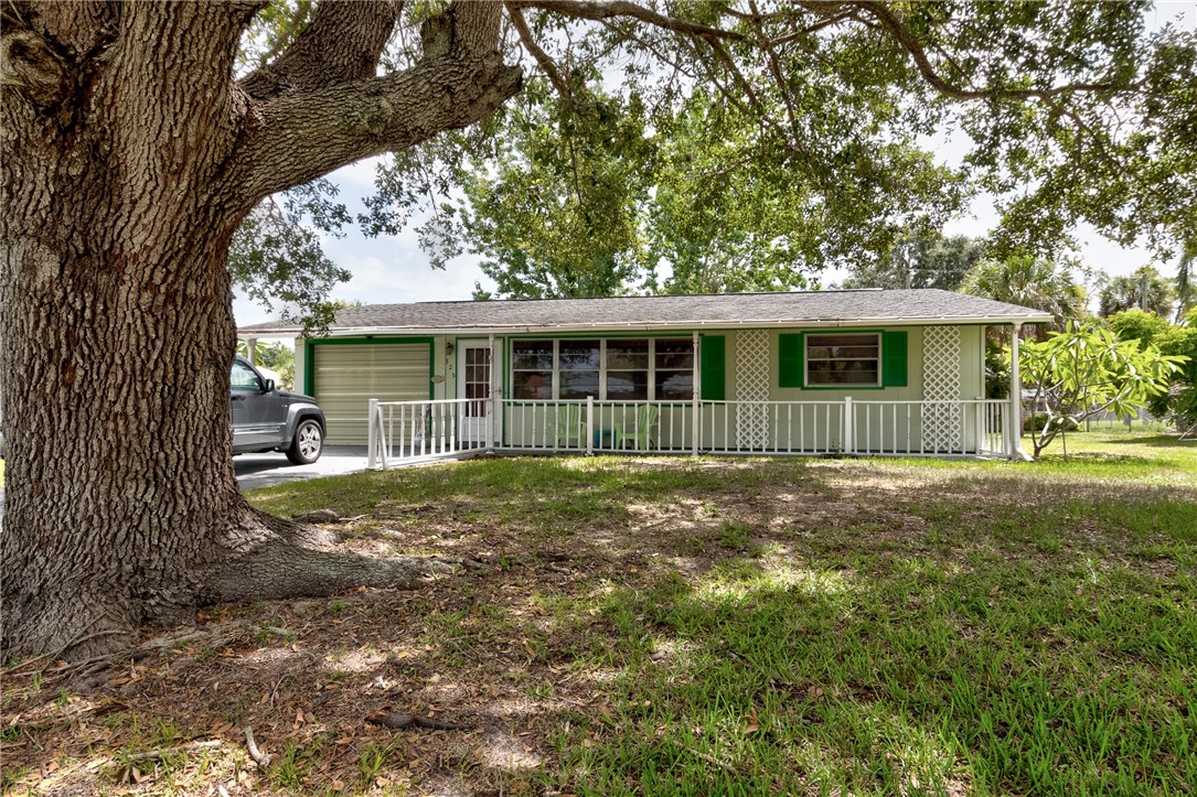 325 Perch Lane Sebastian, FL 32958 - Photo 1 of 26 a view of a house with a yard