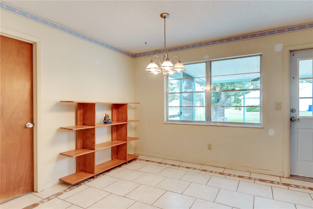 325 Perch Lane Sebastian, FL 32958 - Photo 11 of 26 a view of a windows and chandelier in a room