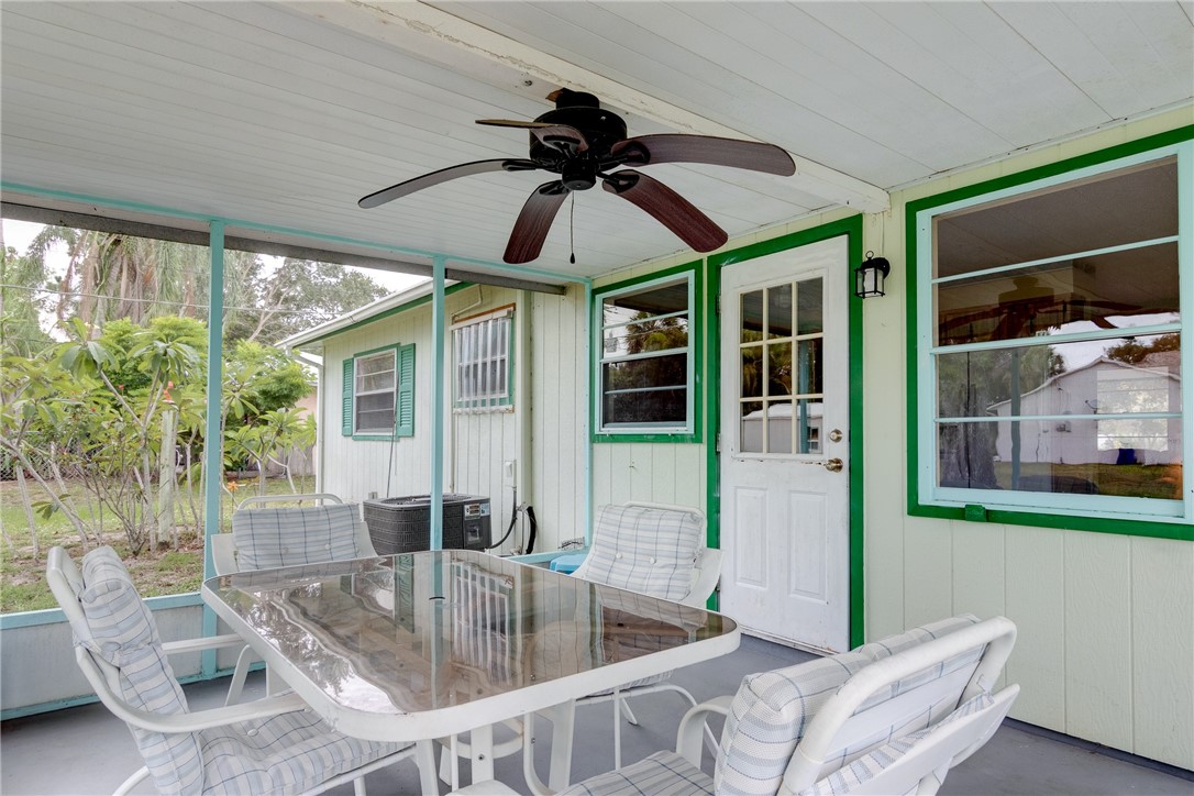 325 Perch Lane Sebastian, FL 32958 - Photo 19 of 26 a view of a dining room with furniture window and outside view