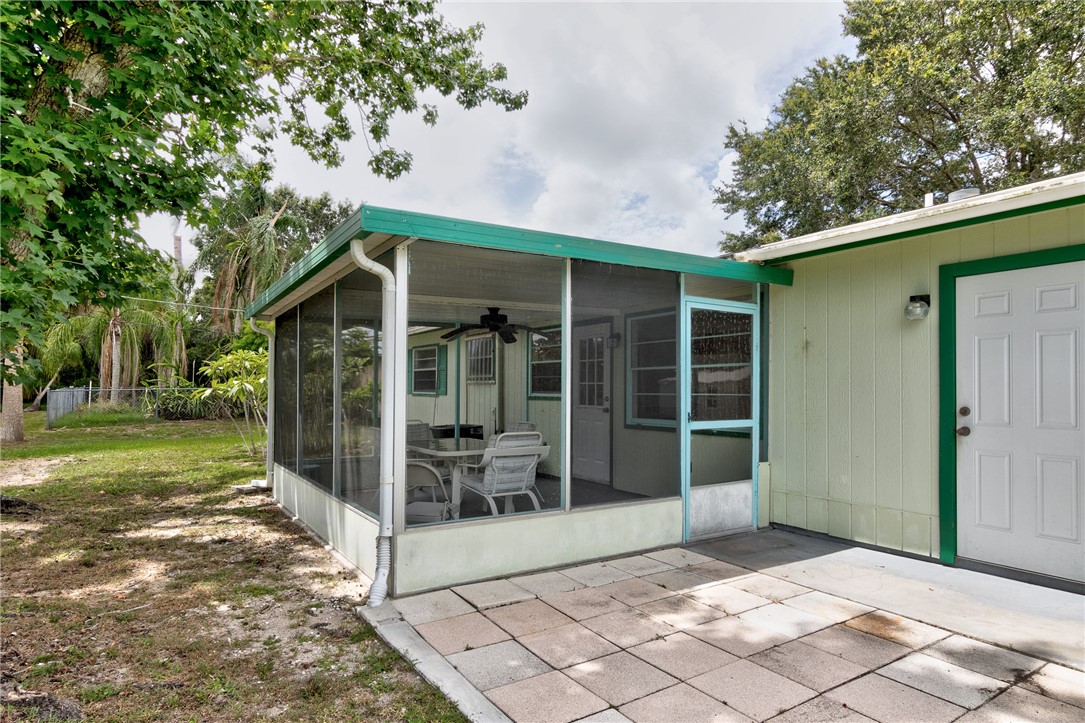 325 Perch Lane Sebastian, FL 32958 - Photo 21 of 26 a view of house with backyard