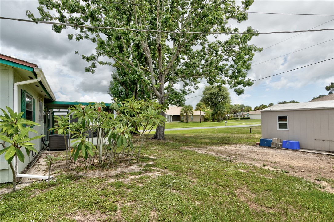325 Perch Lane Sebastian, FL 32958 - Photo 25 of 26 a view of a house with a yard