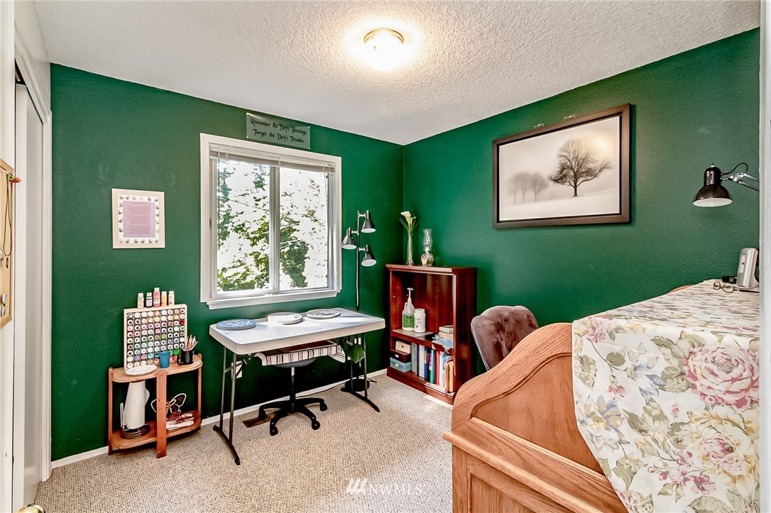 15911 OK Mill Road Snohomish, WA 98290 - Photo 17 of 40 a living room with furniture and a window
