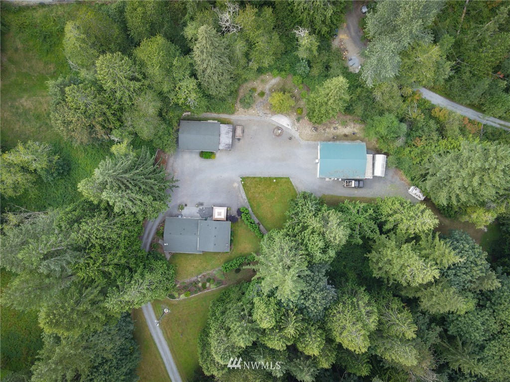 15911 OK Mill Road Snohomish, WA 98290 - Photo 33 of 40 an aerial view of a house with a yard and outdoor seating