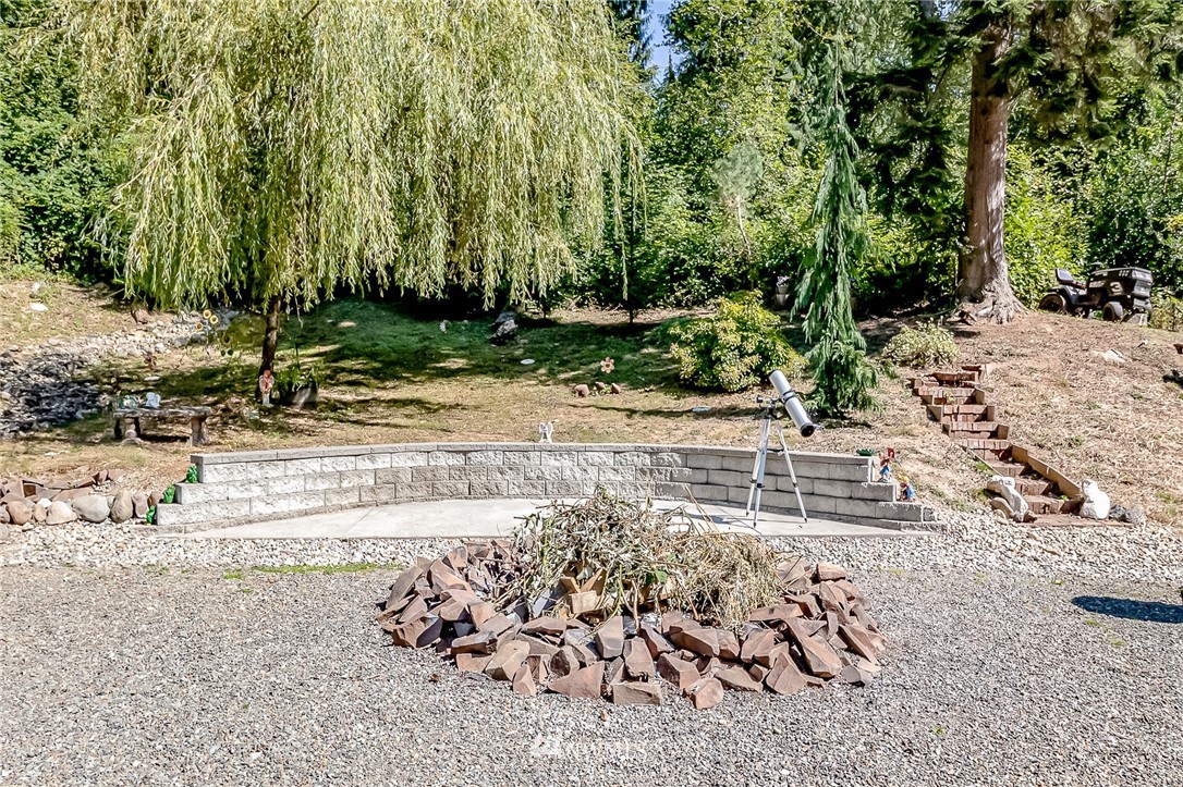 15911 OK Mill Road Snohomish, WA 98290 - Photo 37 of 40 a view of a yard with tree s