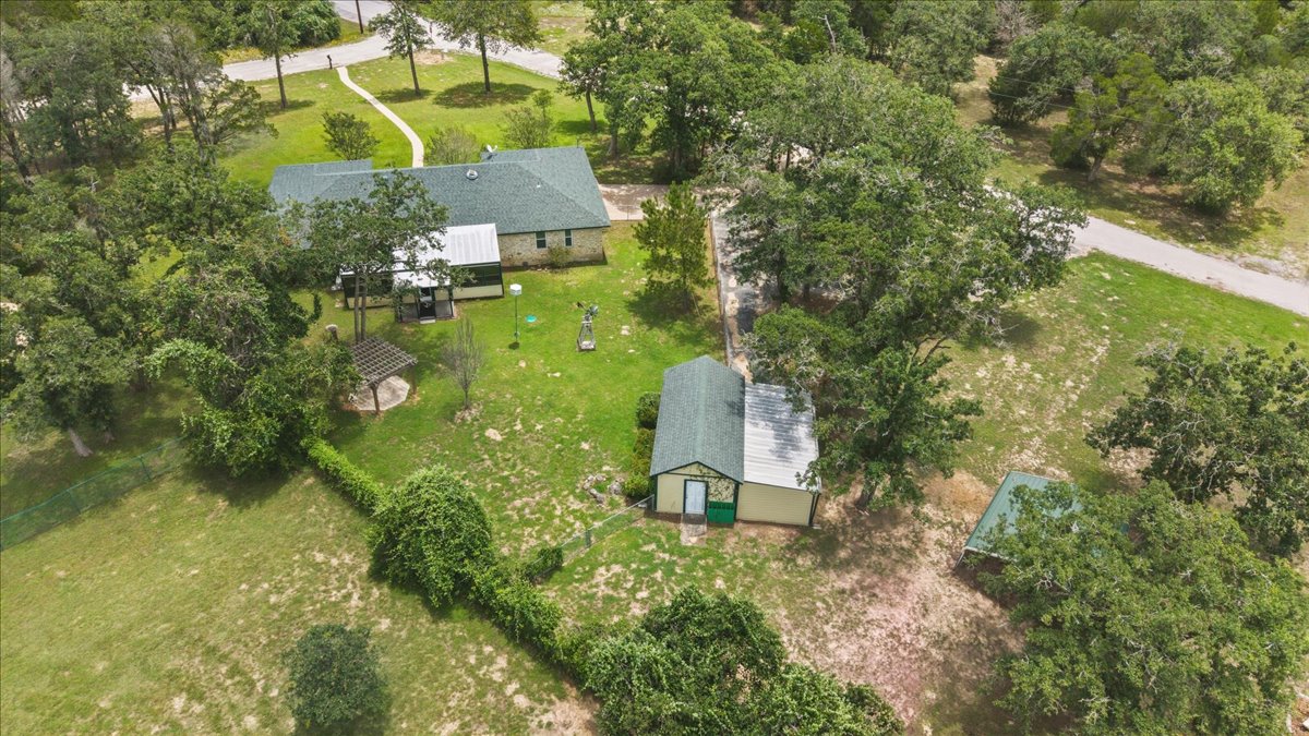 250 Hickory Drive Elgin, TX 78621 - Photo 33 of 37 a aerial view of a house with a yard and a large tree