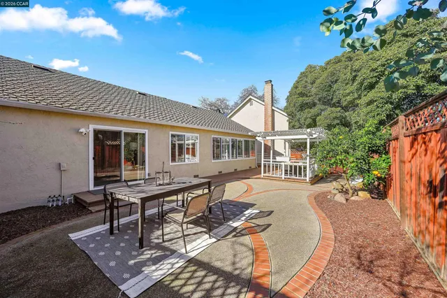 a view of a park with large trees