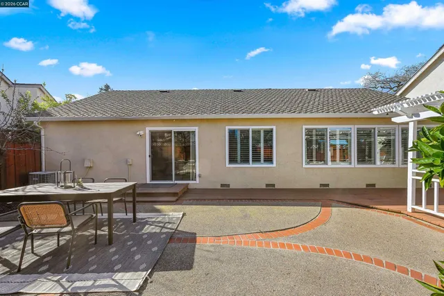 a view of field with tall trees