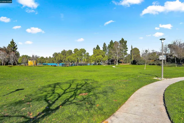 a view of a house with a big yard