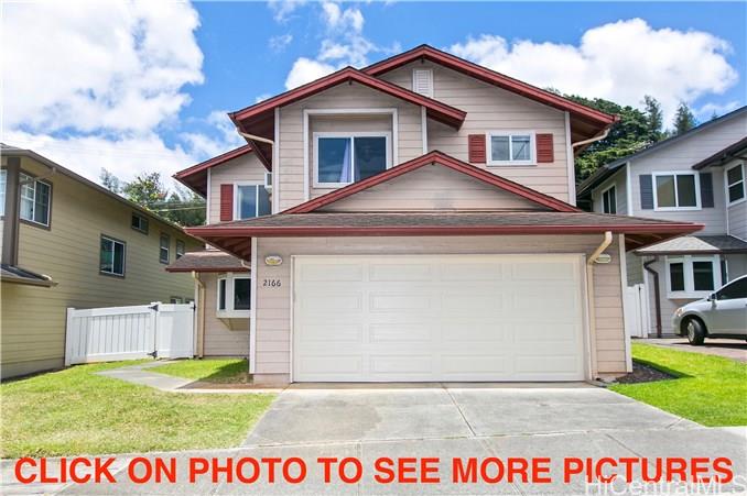 2166 Booth Road Honolulu, HI 96813 - Photo 1 of 1 a view of a yard in front of a house with a small yard