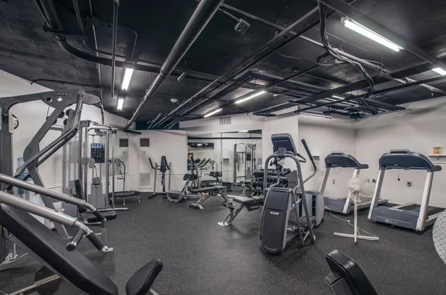 a bathroom with a bathtub and window