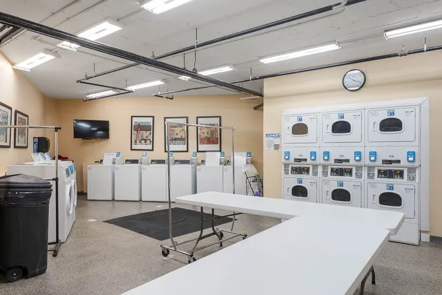 a view of hallway with wooden floor