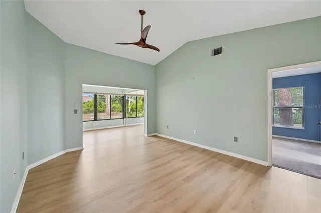 a view of an empty room with a window