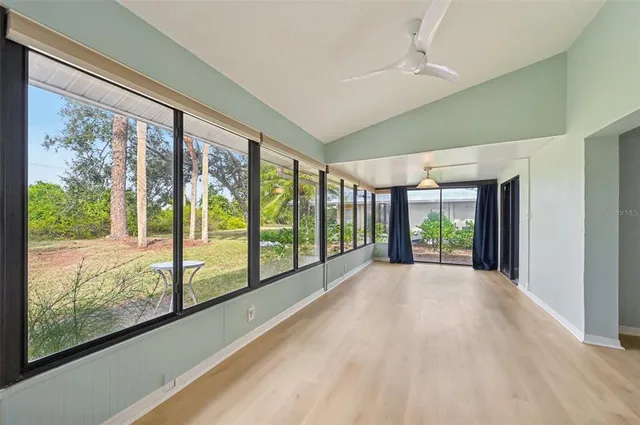 a view of hallway with a large window