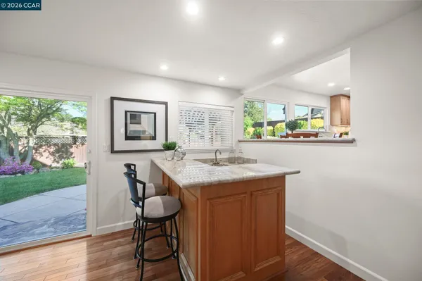 a bathroom with a sink and a window