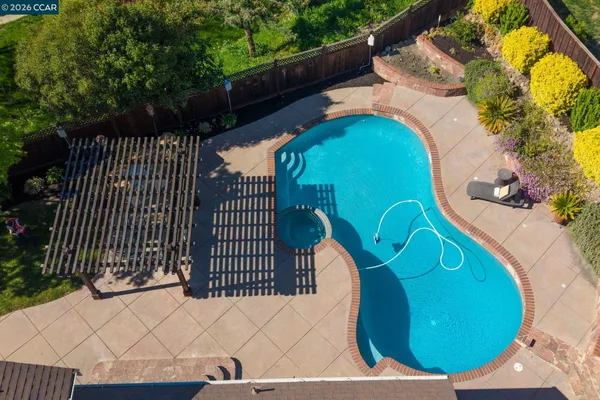 a view of a grassy area with an ocean