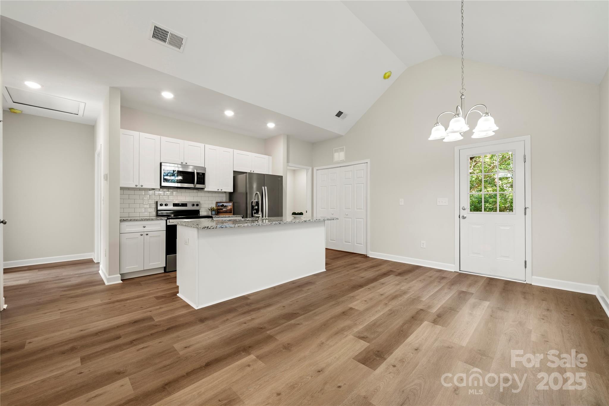 1104 Silver Street Shelby, NC 28152 - Photo 11 of 28 a view of kitchen with microwave and cabinets