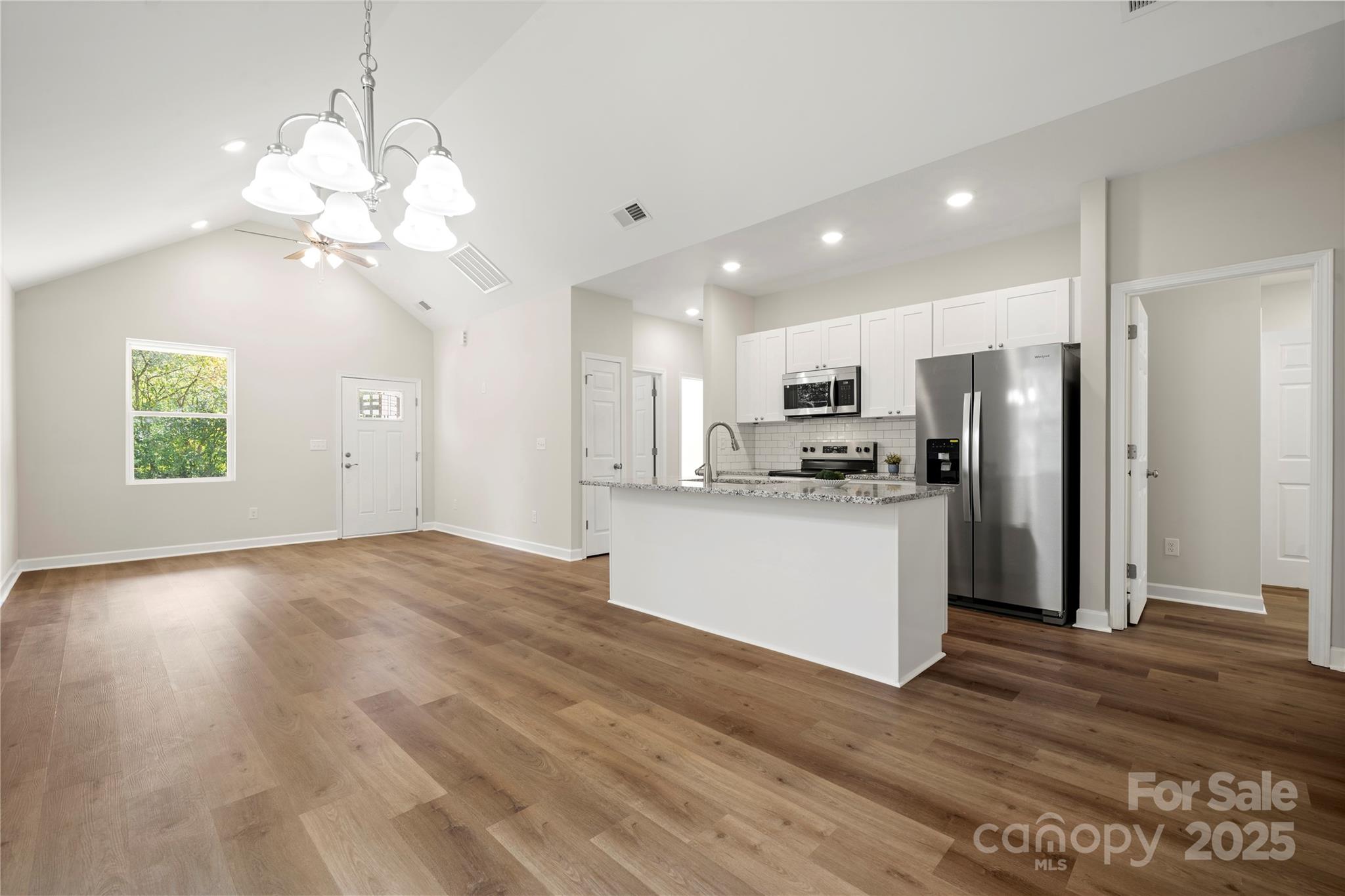 1104 Silver Street Shelby, NC 28152 - Photo 12 of 28 a view of a kitchen with a sink a refrigerator and window