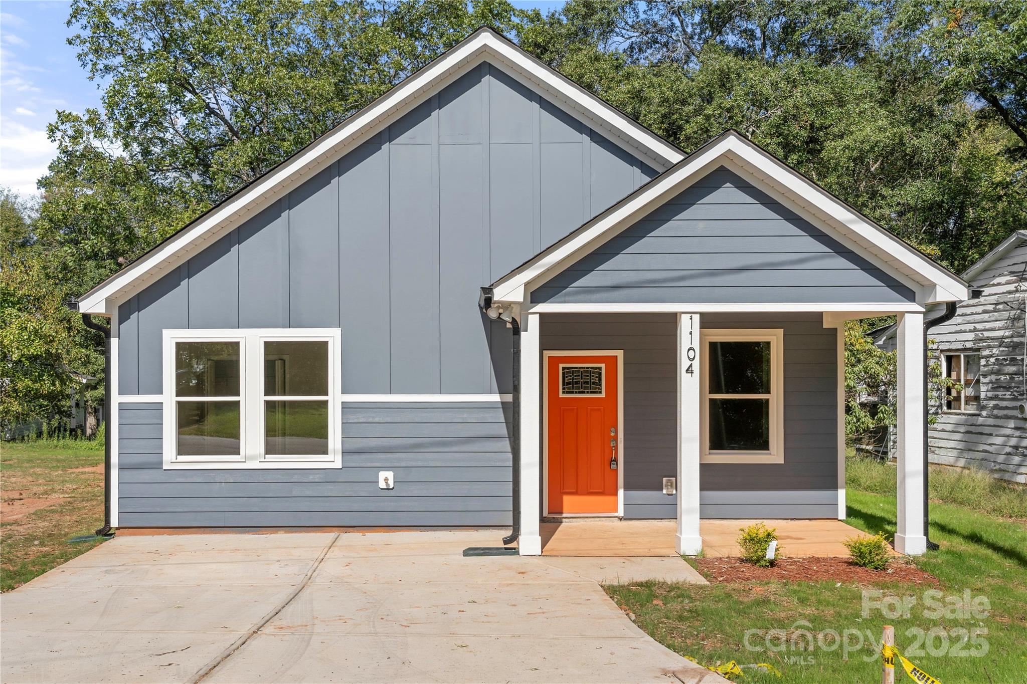 1104 Silver Street Shelby, NC 28152 - Photo 2 of 28 a view of small house with yard and trees in the background