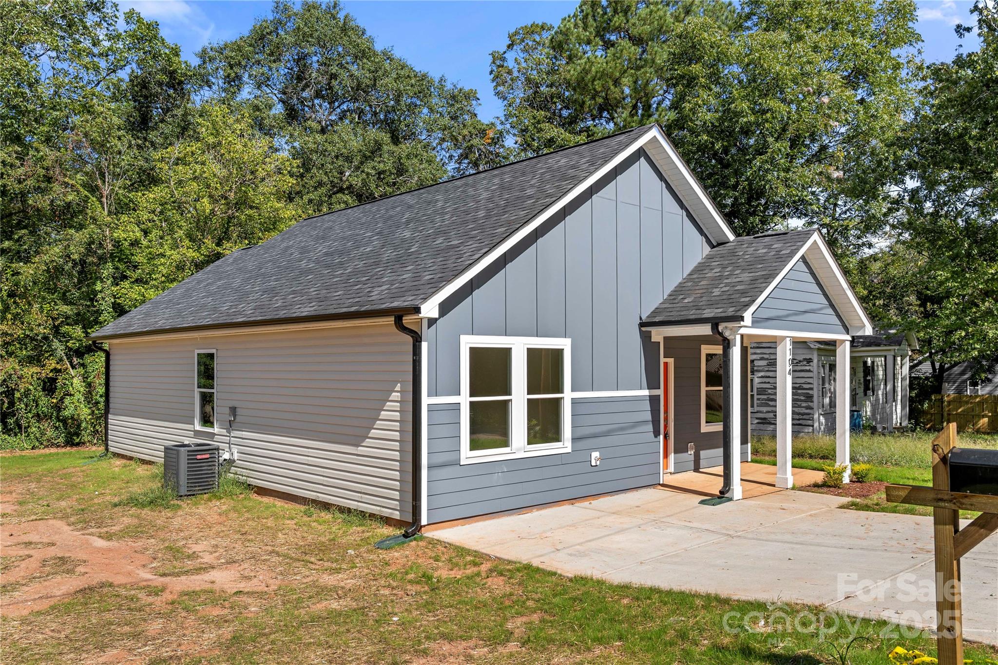 1104 Silver Street Shelby, NC 28152 - Photo 25 of 28 a view of a house with a yard and large tree