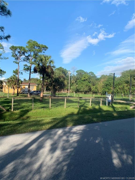 6105 Southwest Gator Trail, Unit A Palm City, FL 34990 - Photo 6 of 19 a view of a golf course with a lake