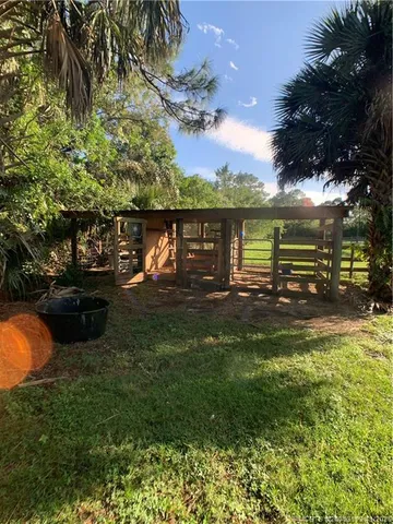 a swimming pool view with a lake view