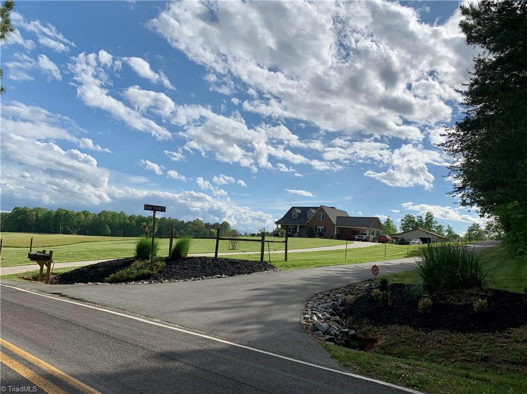 7720 Boyer Farm Road Walnut Cove, NC 27052 - Photo 16 of 49 on Tucker Rd looking at entrance to Boyer Farm Road, the paved private driveway to property