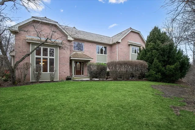 a view of a house with a garden